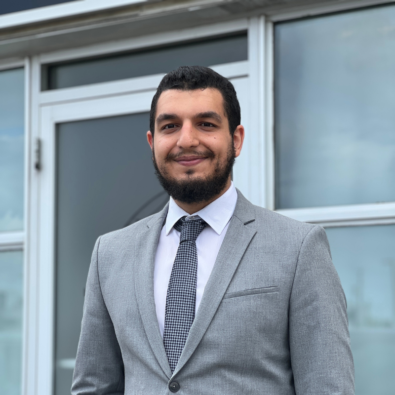 A picture of Abdulla smiling.