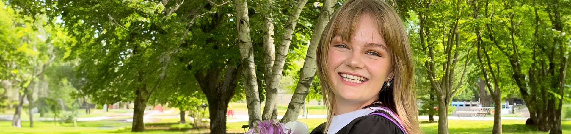 A photo of Faith smiling.