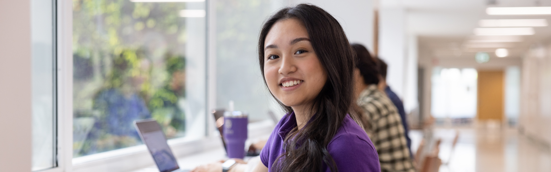 A student smiling